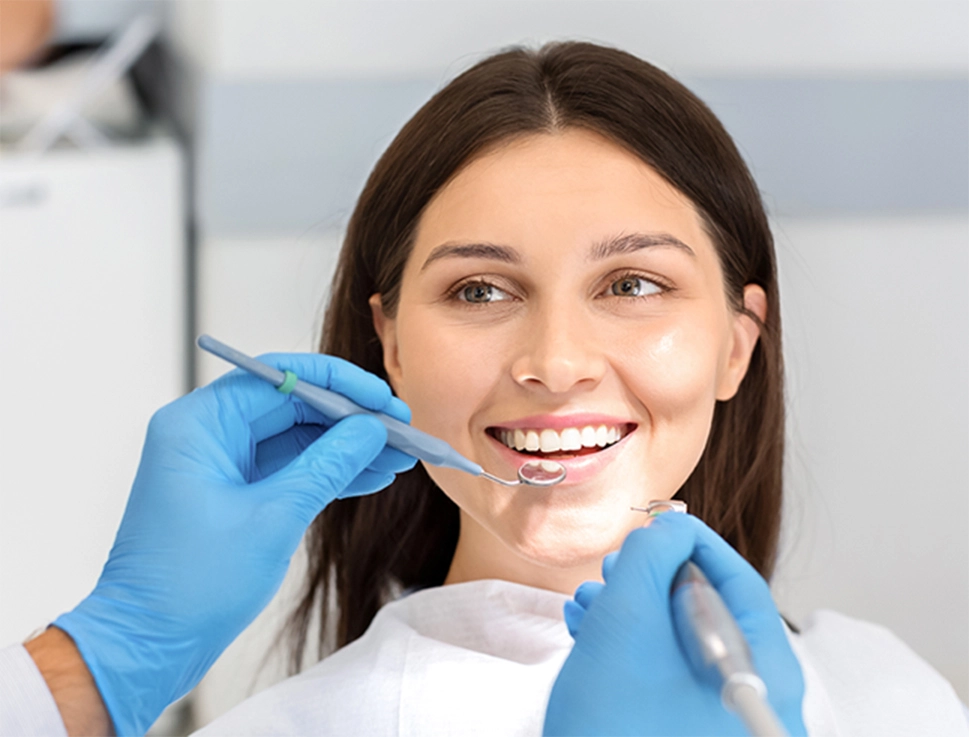 patient receiving dental checkup from dentist in abbotsford, bc
